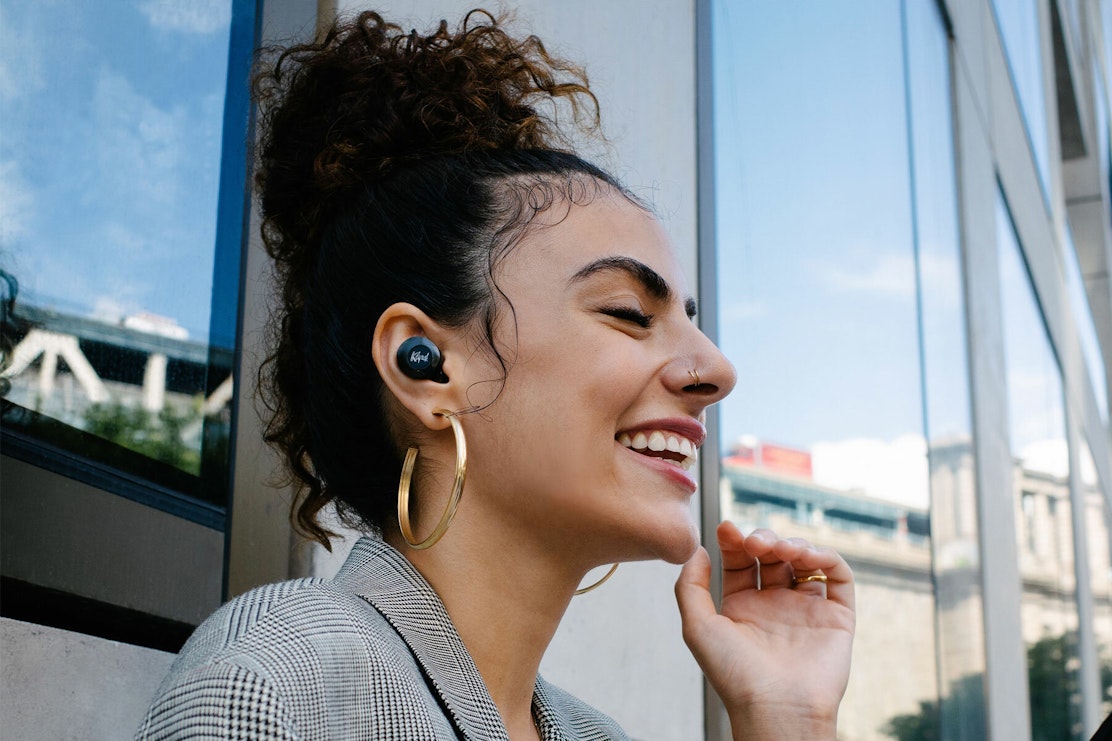 Klipsch T5 ANC woman wearing ANC earbuds